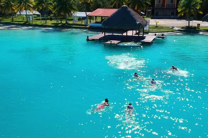 1 Day Tour to Bacalar, Cenotes and 7 color Lagoon with lunch from Cancun - The pontoon ride on Laguna de Siete Colores and Pirates Channel