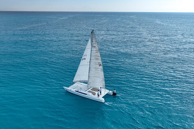 2 in 1 Catamaran to Isla Mujeres Tour from Cancun with Open Bar - Getting to Playa Tortugas and finding Oceanix fast