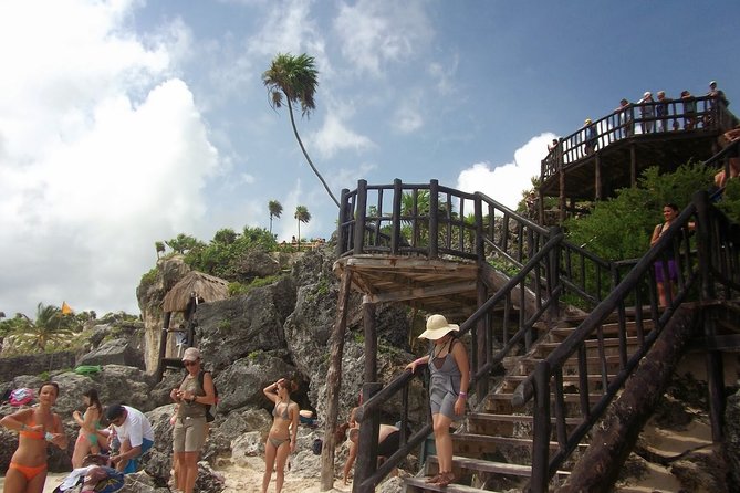 4 PLACES 1 DAY Tour to Coba and Tulum Ruins, Cenote and Playa del Carmen. - Stop 3: Cenote Kuxtal Swim, Trees, Rocks, and Cool Water