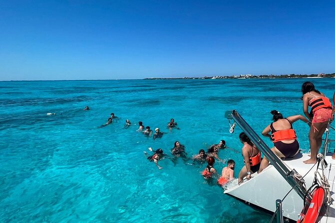 All Inclusive Isla Mujeres Catamaran - Isla Mujeres town time at Playa Centro, walkable shops, and tequila tasting