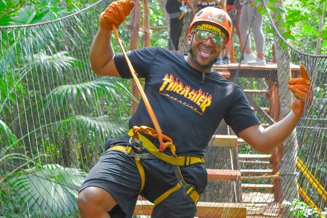 Amazing ATV Tour, Ziplines and Cenote Swim with Lunch and round trip included - Zipline circuit: treetop thrills with phone and photo tradeoffs