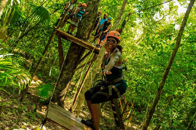 Amazing ATV Tour, Ziplines and Cenote Swim with Lunch and round trip included - ATV riding in the jungle: Honda or Yamaha, solo or double