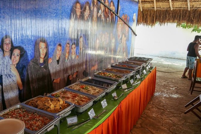 Amazing tour to the beauty Isla Mujeres with Snorkel and open bar - Isla Mujeres beach club lunch and downtime: where the day slows down