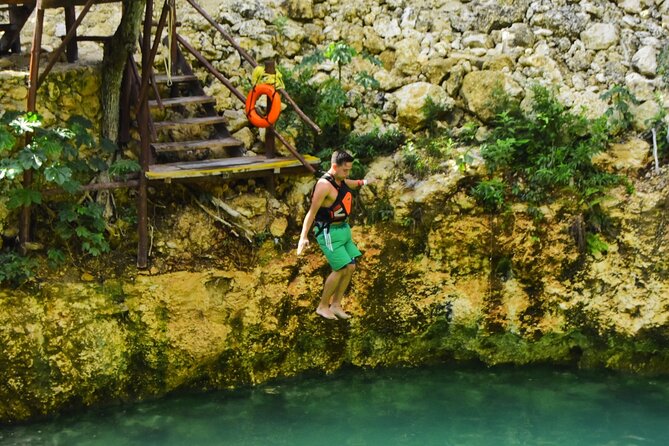 ATV's (shared), Ziplines & Cenote! Half-Day with Transportation from Cancun - Zip-line Over the Jungle: Harnessing, Platform Coaching, and Flight Time