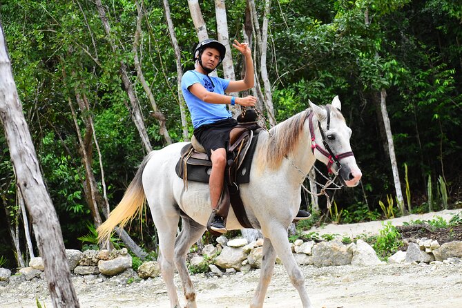 ATV (shared), Horse Back Riding, Ziplines, & Cenote from Cancún - Horseback riding in the rainforest, less rush, more nature