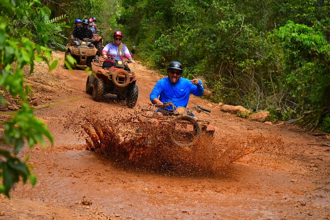 Awesome ATV experience in the jungle with cenote swim and ziplines included - Zipline circuit over jungle views: fun plus real limits