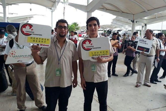 Cancun Airport Transfers - Private Van ROUND TRIP - Meeting Your Driver at Cancun Airport Terminal Doors
