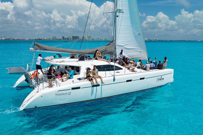 Cancun Catamaran: Isla Mujeres, Snorkeling, Drinks & Buffet Lunch - Where you start: Playa Tortugas Marina and boarding logistics