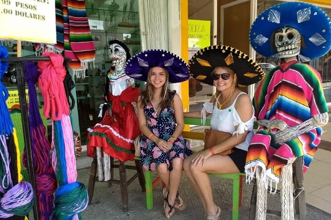 Cancun City Sightseeing and Shopping Tour on a Double Decker bus - Playa Delfines and the Cancun Sign Photos (Weather-Dependent)