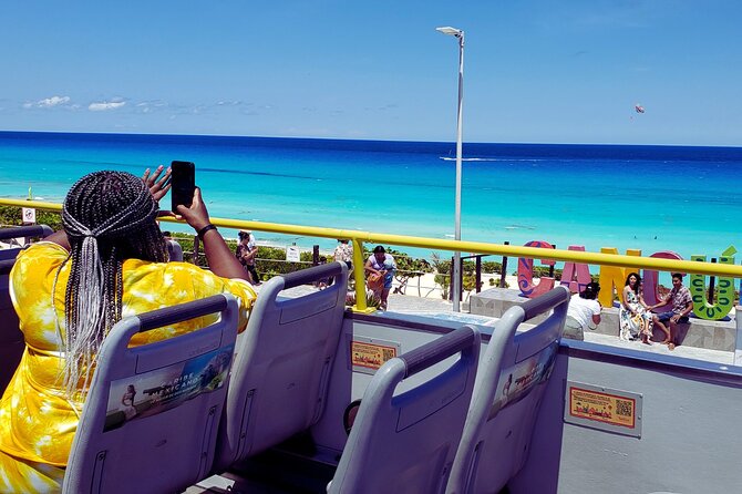 Cancun City Tour by Downtown and Turistic Hightlights on Open Bus - Shopping stops, souvenirs, and bargaining energy