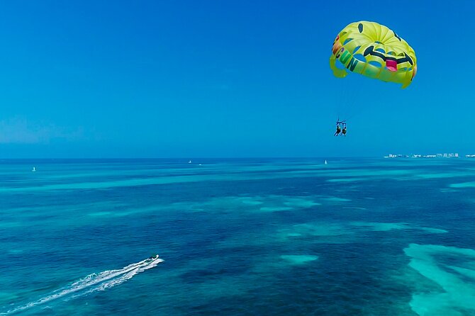 Cancun Combo Adventure: 4-Reef Stop Snorkeling and Parasail Ride - How the Day Flows, From Boarding to Back on Land