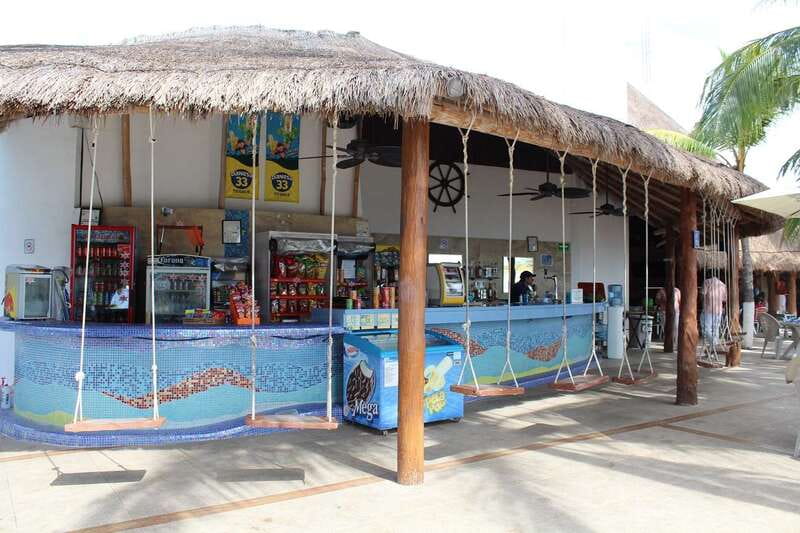 Cancún: Dolphin Encounter on Isla Mujeres with Buffet - The dolphin encounter: handshake, hug, and underwater platform viewing