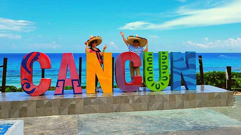 Cancun: Guided City Tour with Shopping by Double Decker Bus - Pickup and the Double-Decker Bus: How You Start Seeing Cancun
