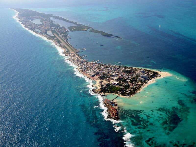 Cancun: Half Day Private Catamaran to Isla Mujeres - Isla Mujeres beach time: turquoise water plus the kind of peace you cannot fake