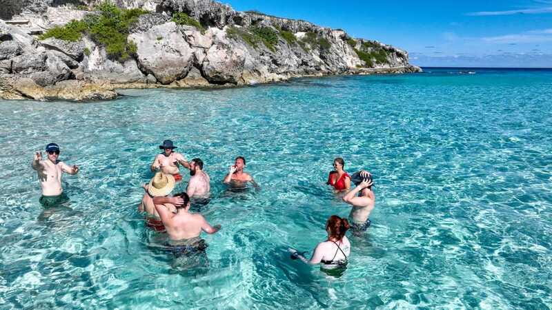Cancun: Half Day Private Catamaran to Isla Mujeres - Staying in control of onboard photos: a real caution from one review