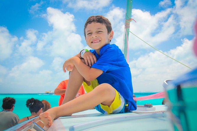 Cancun Half-Day Sailing Catamaran Cruise to Isla Mujeres - The catamaran cruise vibe, open bar, and why the crew matters