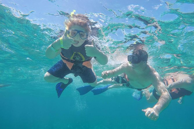 Cancun Half-Day Sailing Catamaran Cruise to Isla Mujeres - Food, snacks, and open bar without losing the plot