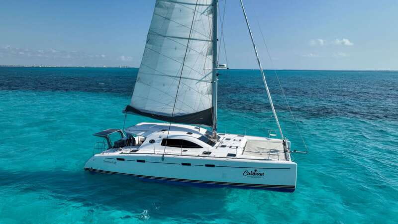 Cancun: Isla Mujeres Catamaran + Coco Bongo Show - Arrecife El Meco snorkeling: short session, bring your patience
