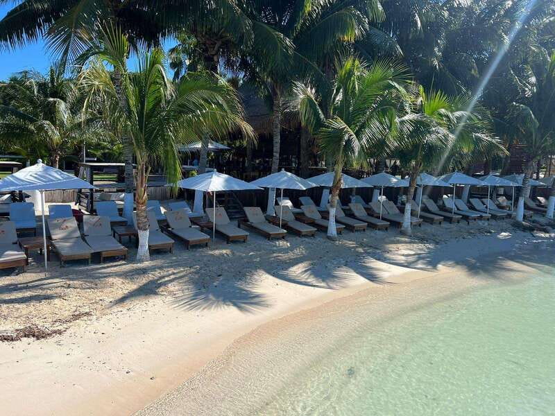 Cancun: Isla Mujeres Catamaran + Coco Bongo Show - Isla Mujeres town time: sightseeing, snacks, and shopping reality