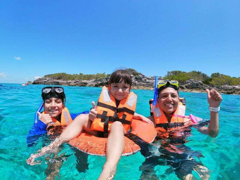 Cancun: Isla Mujeres Catamaran Tour with Open Bar of Drinks - The cruise and music on board, what to expect during the ride