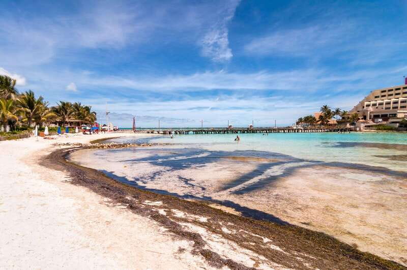 Cancun: Isla Mujeres Catamaran Tour with Open Bar of Drinks - Free time on Isla Mujeres, walking and shopping at your pace