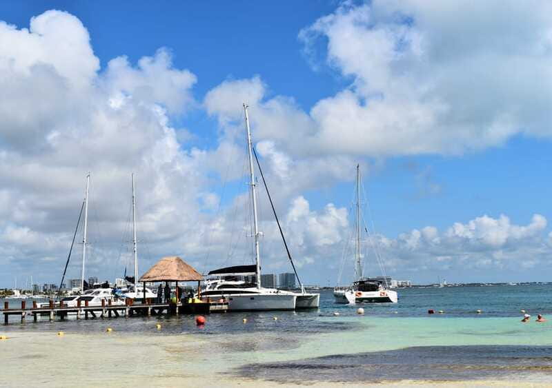 Cancun: Isla Mujeres Catamaran with buffet, drinks & snorkel - The sail experience: open bar on the water, with a “real trip” feel