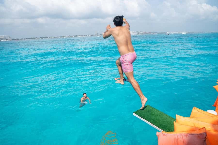 Cancun: Isla Mujeres Full Day Dancer Cruise - Zaza Yacht and Beach Club stop: drinks and a change of scenery
