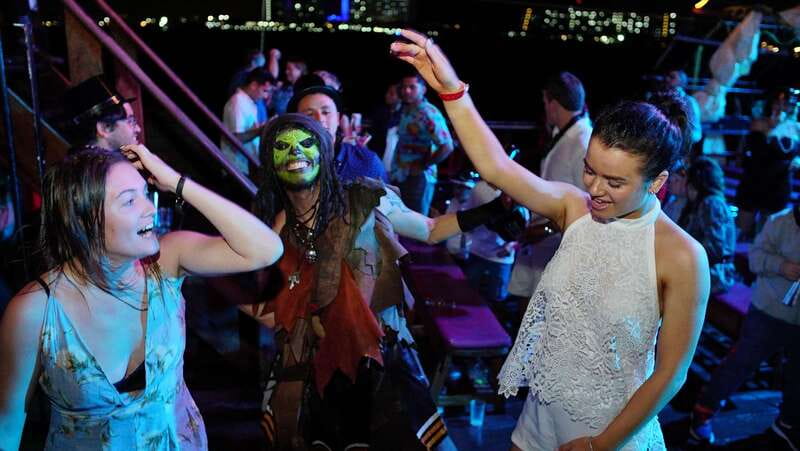 Cancún: Jolly Roger Pirate Dinner Cruise 2025 - Captain Black Jack, the pirate show, and fireworks with real impact
