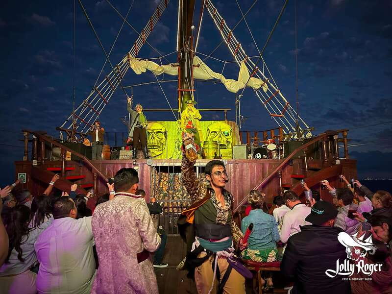 Cancún: Jolly Roger Pirate Dinner Cruise 2025 - Getting on board at Terminal Marítima de Punta Sam, pirate village style