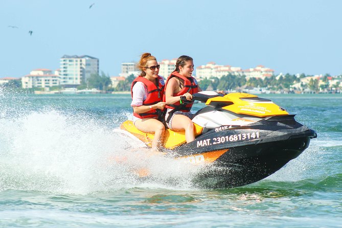 Cancun Mangrove Jet Ski Tour: 2 riders per jet ski - Price math for $200 per group, plus the $20 cash dock fee per jet ski