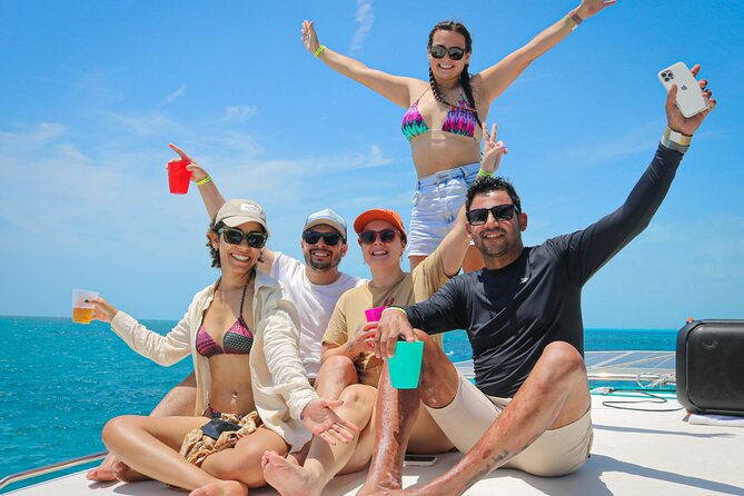 Cancun: Private Catamaran with Open Bar & Snorkeling Option - Getting aboard at Marina Adventure Bay, and what to expect at check-in