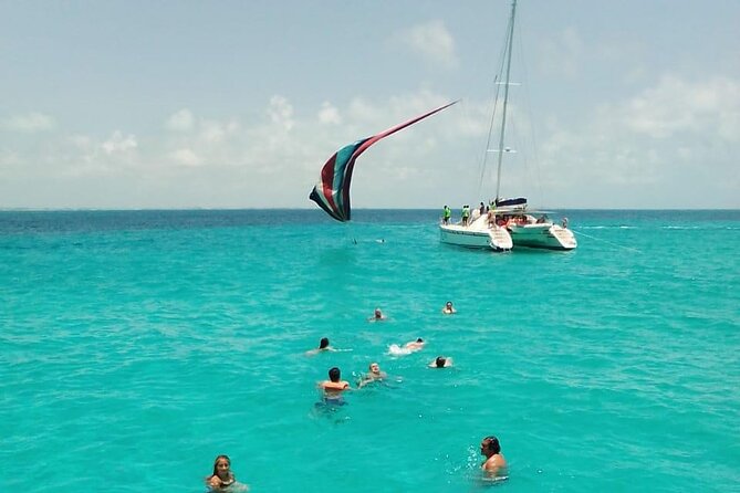 Cancun Sailing Catamaran Islas Mujeres With Luxury Beach Club - 1.5 hours to explore Isla Mujeres center, no guide