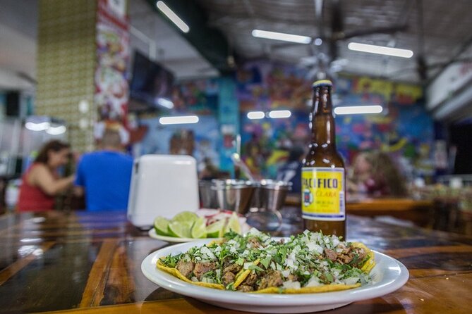 Cancun Taco & Beer Fiesta: Authentic Mexican Tasting Experience - Transportation reality: Cancun pickup is included, but options differ