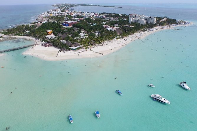 Catamaran adventure to Isla Mujeres with Snorkel,Buffet,Open Bar and Beach Club - Open bar at sea, spinnaker photos, and the reality of timing