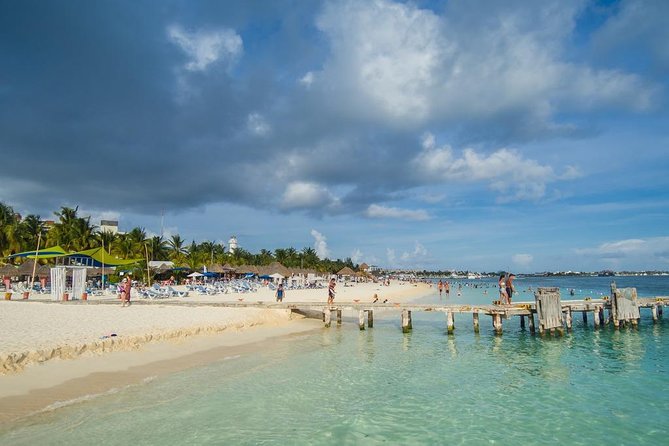 Catamaran adventure to Isla Mujeres with Snorkel,Buffet,Open Bar and Beach Club - The party boat factor: open bar, music, and who will enjoy it