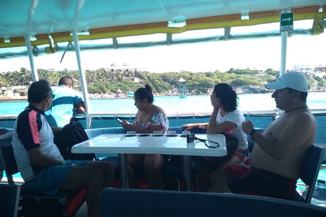Catamaran Adventure Tour Isla Mujeres Unlimited from Cancun with Transportation - The Catamaran Ride: Open Bar, Contests, and a Real Party Tempo