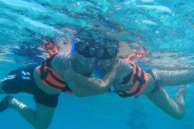 Catamaran family friendly Tour to Isla Mujeres with lunch - Isla Mujeres Downtown for One Hour: The One-Hour Reality Check