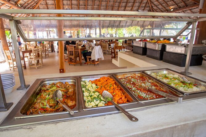 Catamaran family friendly Tour to Isla Mujeres with lunch - Getting Your Lunch and Beach Time at Amazona Beach Bar
