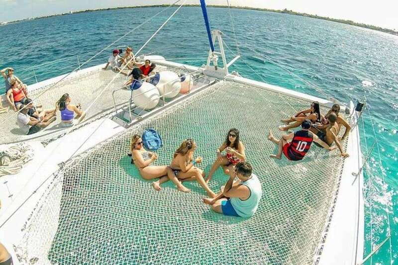 Catamaran party Isla Mujeres with drinks & lunch - Cruise time and views on the Caribbean route