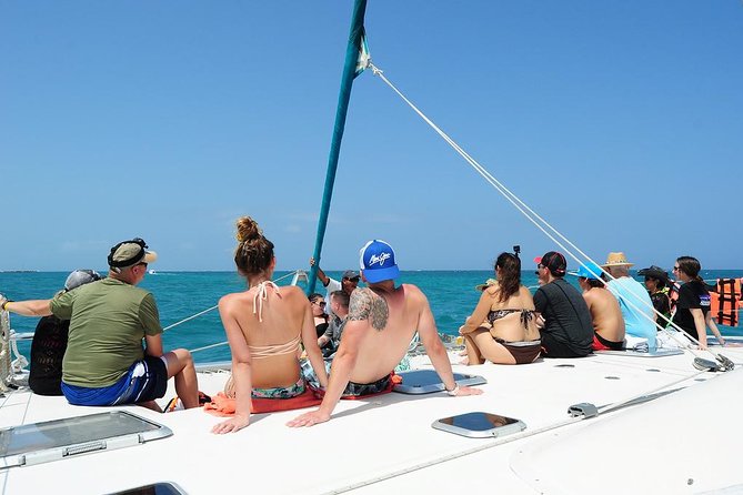 Catamaran Sail and Snorkeling Tour with Open Bar in Puerto Morelos - Sailing time and the beach views: what happens between reef stops