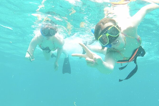 Catamaran Snorkeling with Openbar & Lunch Cancun to Isla Mujeres - Onboard vibe: music, domestic open bar, and tequila tasting