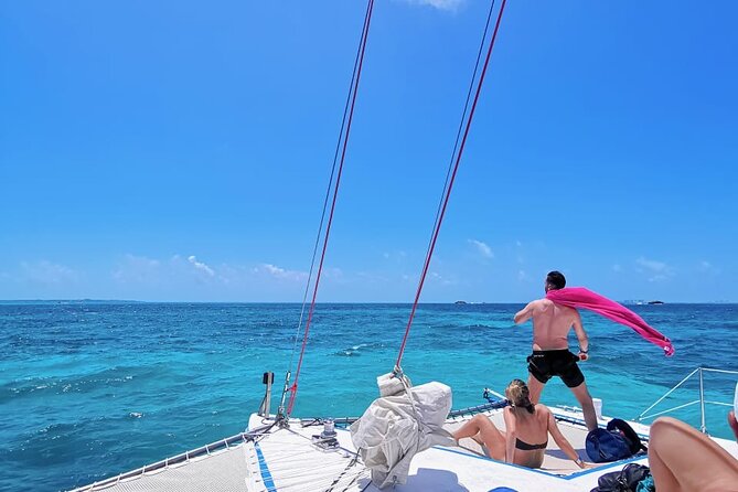 Catamaran to Isla Mujeres, Open bar, buffet, Beach Club Included - Cancun to Isla Mujeres by catamaran, with a built-in party vibe