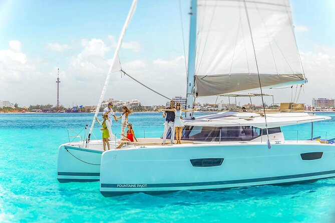 Catamaran to Isla Mujeres Snorkeling Tour with Open Bar and Lunch - Isla Mujeres Town Time: Quick Browsing, Not a Full City Day
