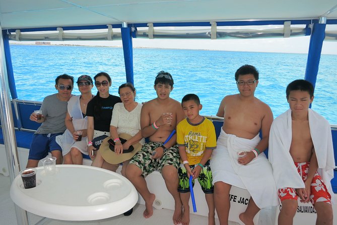 Catamaran Tour to Isla Mujeres all Included - Isla Mujeres exploration: make the most of the walk-around window