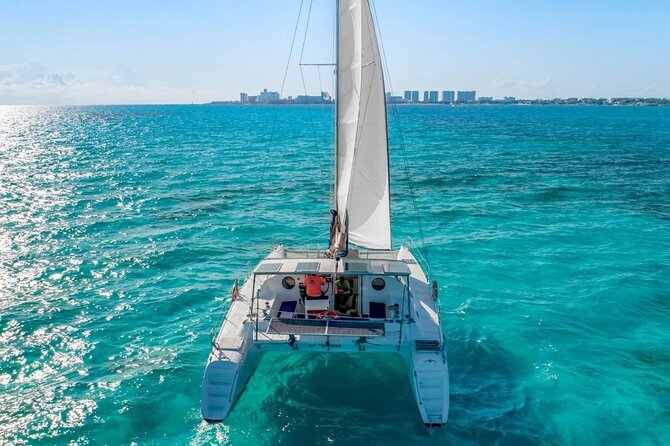 Catamaran Tour to Isla Mujeres from Cancún with Bar and Lunch - From Playa Tortugas to Isla Mujeres: The 8-Hour Flow