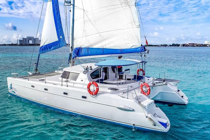 Catamaran Tour to Isla Mujeres from Cancún with Bar and Lunch - Open Bar and Beach Club Time: Where the Day Actually Unwinds