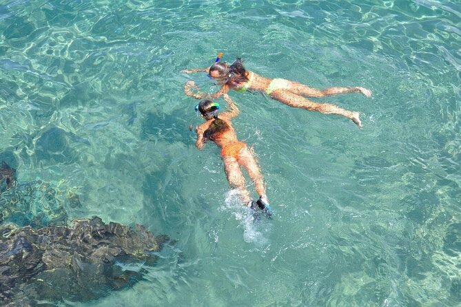 Catamaran Unlimited Adventure to Isla Mujeres" From Cancun - Beach Club Time With Buffet Lunch and Pool Break