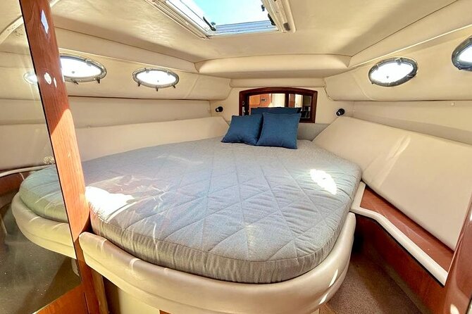 Cruise in Elegance: Luxury Yacht Rental in Cancun - Cancun Lagoon Views: Channels, Birds, and Hotel Geometry