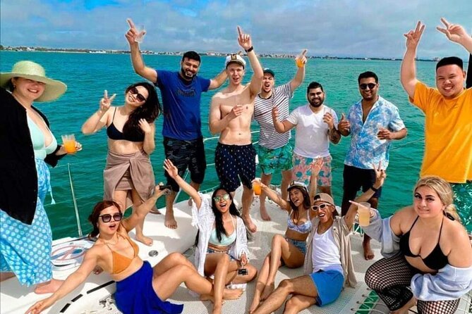 Deluxe Catamaran to Isla Mujeres, with Drinks, Snorkel & Buffet - Beach Club Buffet and Attractions: The Comfort Food Finish