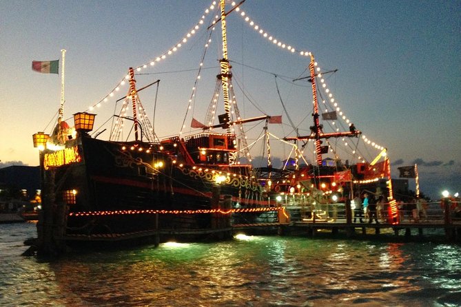 Dinner & Live Pirate Fight from Cancun - Boarding show energy: costumes, contests, sword fights, and an on-board TV